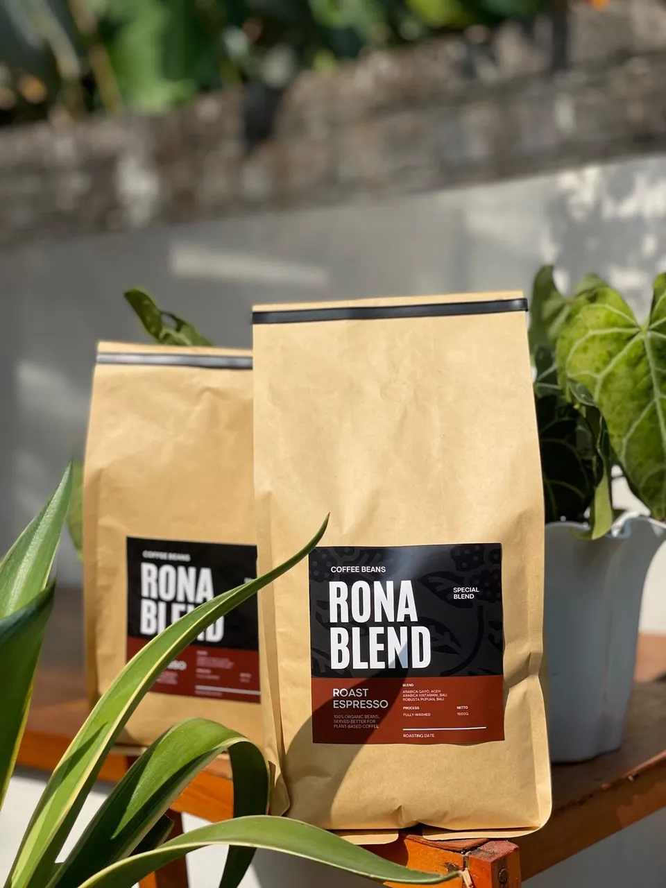Two bags of Rona Blend espresso beans on the counter